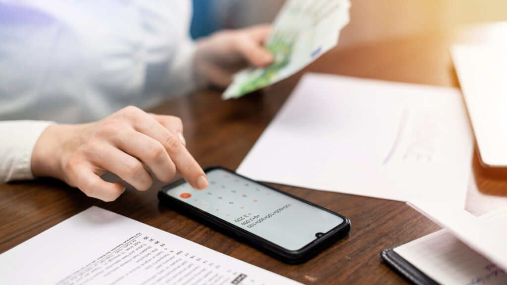 Woman working with finances on the table